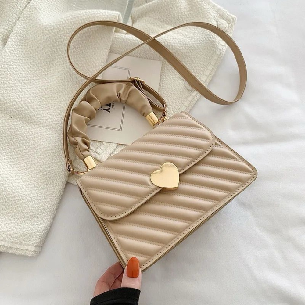 Elegant Cream Quilted Handbag